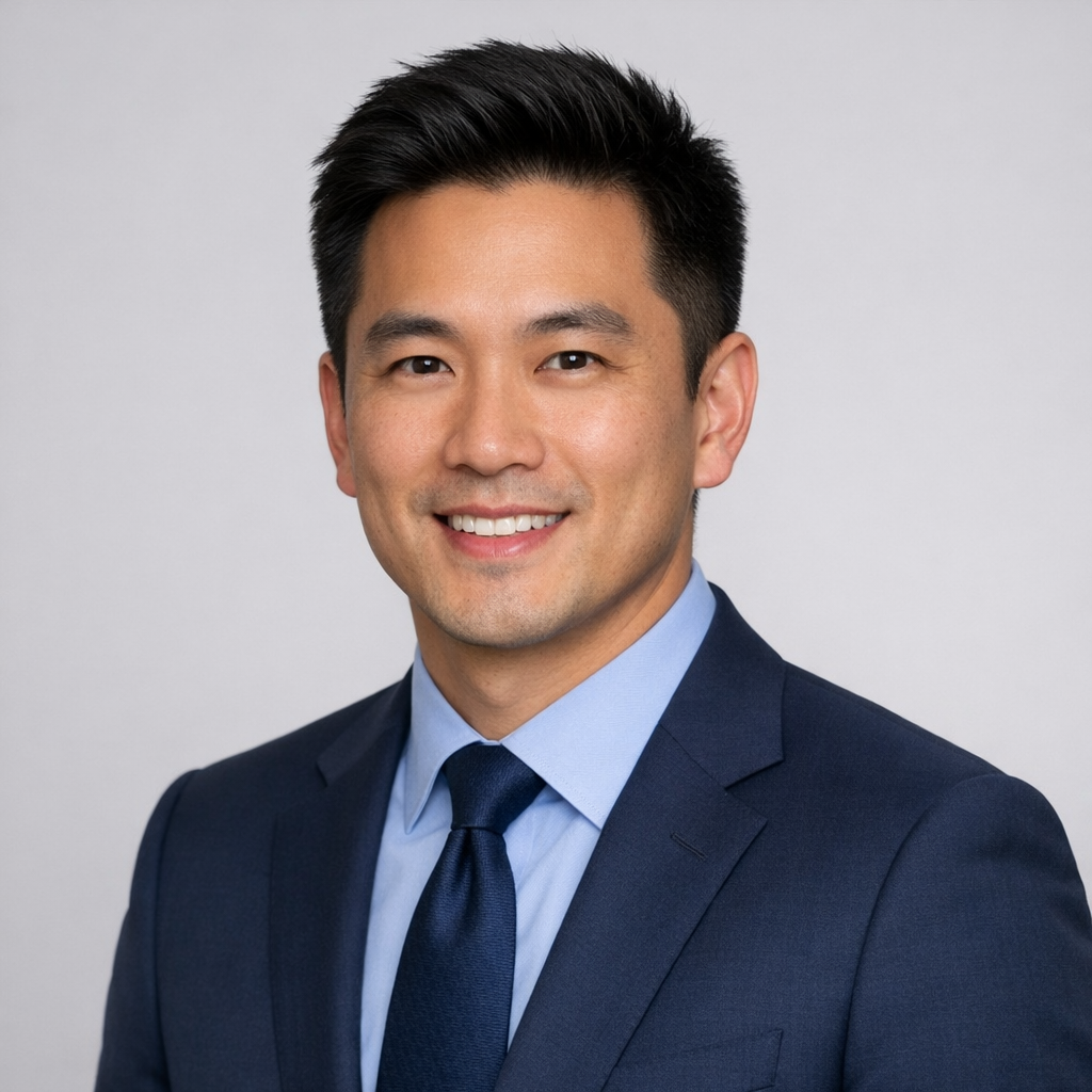 Professional headshot of Marcus Chen with clear, simple background